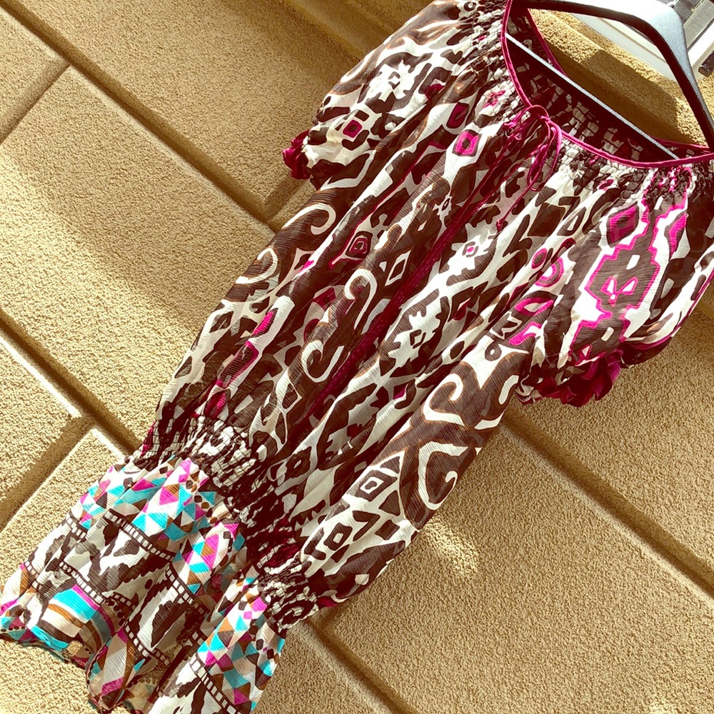 Tunic style shirt.  Xoxo  medium